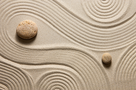 Feng Shui Rocks in Swirling Sand